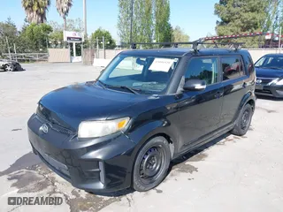 2012 Scion xB with VIN JTLZE4FE4C1143412, listed as a IAAI auction lot 42091929 with 213,501 mi miles. Bid and sale history available at carsss.com. Image 6.