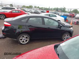 2018 Ford Fiesta SE z VIN 3FADP4BJ0JM104163, wystawiony jako IAAI lot #42306860 z przebiegiem 45 992 mil mil oraz . Historia ofert i sprzedaży dostępna na DreamBid. Obrazek 13.