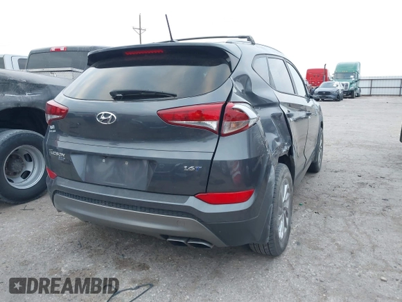 2016 Hyundai Tucson Sport with VIN KM8J33A26GU189300, listed as a IAAI auction lot 41372422 with 94,848 mi miles. Bid and sale history available at carsss.com. Image 4.