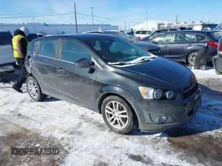 2013 Chevrolet Sonic LT with VIN 1G1JC6SG1D4250167, listed as a IAAI auction lot 41498238 with 66,750 mi miles. Bid and sale history available at carsss.com. Image 1.