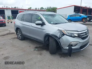 2017 Honda Pilot Elite with VIN 5FNYF6H02HB018120, listed as a IAAI auction lot 42628384 with 118,906 mi miles and . Bid and sale history available at DreamBid. Image 1.