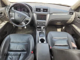2010 Ford Fusion Hybrid z VIN 3FADP0L39AR152224, wystawiony jako Copart lot #60549615 z przebiegiem 118 939 mil mil oraz Szkoda całkowita • Salvage title. Historia ofert i sprzedaży dostępna na DreamBid. Obrazek 8.