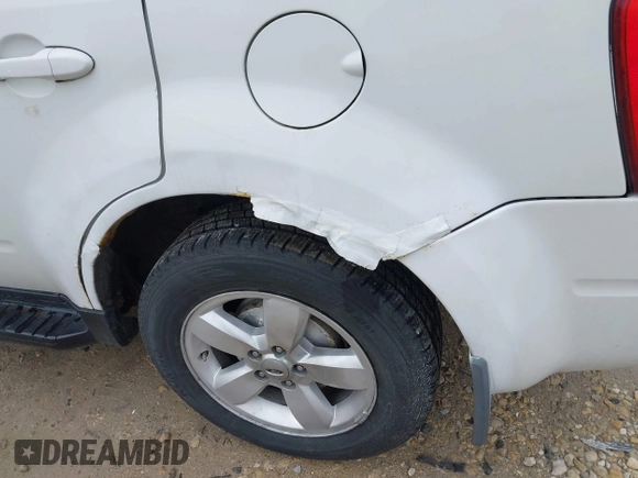2011 Ford Escape Limited with VIN 1FMCU9EG6BKA51405, listed as a IAAI auction lot 42007801 with 162,904 mi miles. Bid and sale history available at carsss.com. Image 6.