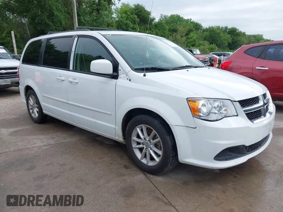 2015 Dodge Grand Caravan SXT with VIN 2C4RDGCG2FR548433, listed as a IAAI auction lot 42121256 with 161,459 mi miles and . Bid and sale history available at DreamBid. Image 1.