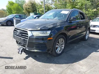 2017 Audi Q3 Premium Plus z VIN WA1JCCFS5HR001068, wystawiony jako IAAI lot #42038452 z przebiegiem 136 661 mil mil oraz . Historia ofert i sprzedaży dostępna na DreamBid. Obrazek 6.