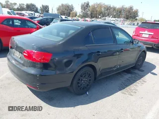 2011 Volkswagen Jetta Sedan SE w/Convenience & Sunroof PZEV with VIN 3VWDZ7AJ2BM133265, listed as a IAAI auction lot 41974851 with 115,144 mi miles. Bid and sale history available at carsss.com. Image 4.