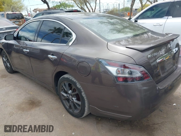 2014 Nissan Maxima S with VIN 1N4AA5AP0EC431251, listed as a IAAI auction lot 42120884 with 163,628 mi miles and . Bid and sale history available at DreamBid. Image 3.