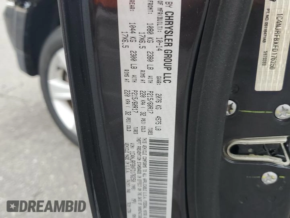2015 Jeep Patriot Latitude with VIN 1C4NJRFBXFD176250, listed as a Copart auction lot 58903295 with 72,675 mi miles and Salvage title. Bid and sale history available at DreamBid. Image 13.
