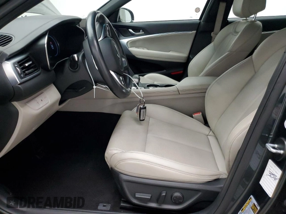 2023 Genesis G70 2.0T with VIN KMTG34TA1PU126969, listed as a Copart auction lot 65612834 with 37,359 mi miles and Salvage Title. Bid and sale history available at DreamBid. Image 7.