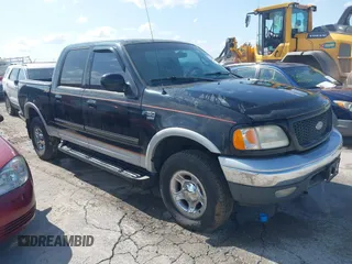 2001 Ford F-150 XLT z VIN 1FTRW08W41KE12961, wystawiony jako IAAI lot #42521964 z przebiegiem Nie podano mil oraz . Historia ofert i sprzedaży dostępna na DreamBid. Obrazek 1.