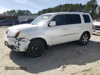2012 Honda Pilot Touring with VIN 5FNYF4H97CB083346, listed as a Copart auction lot 48261855 with 127,723 mi miles and Salvage Title. Bid and sale history available at DreamBid. Image 1.