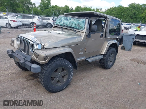 2004 Jeep Wrangler Sahara with VIN 1J4FA59S54P740417, listed as a IAAI auction lot 42382078 with 200,108 mi miles and . Bid and sale history available at DreamBid. Image 18.