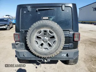 2013 Jeep Wrangler Unlimited Rubicon with VIN 1C4BJWFG2DL533839, listed as a Copart auction lot 88917985 with 112,673 mi miles and Salvage Title. Bid and sale history available at carsss.com. Image 6.