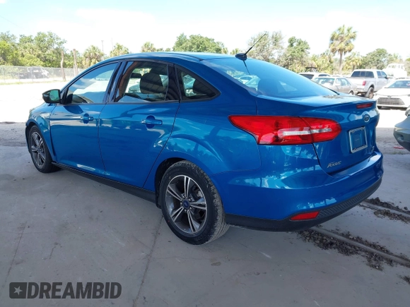 2016 Ford Focus SE with VIN 1FADP3FE3GL226145, listed as a IAAI auction lot 42166519 with 85,769 mi miles. Bid and sale history available at carsss.com. Image 3.