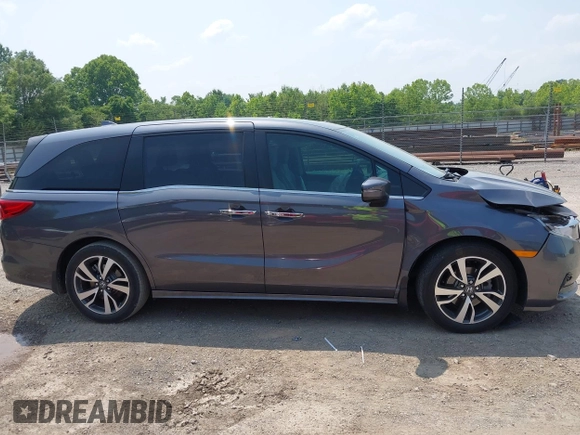 2022 Honda Odyssey Touring z VIN 5FNRL6H83NB023583, wystawiony jako IAAI lot #42425498 z przebiegiem Nie podano mil oraz . Historia ofert i sprzedaży dostępna na DreamBid. Obrazek 12.