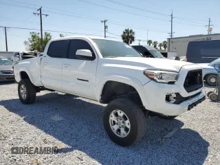 2017 Toyota Tacoma SR5 z VIN 5TFDZ5BN0HX025190, wystawiony jako Copart lot #53604695 z przebiegiem 163 039 mil mil oraz Szkoda całkowita • Salvage title. Historia ofert i sprzedaży dostępna na DreamBid. Obrazek 4.