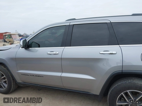 2019 Jeep Grand Cherokee Limited z VIN 1C4RJEBG8KC752297, wystawiony jako IAAI lot #41580741 z przebiegiem 142 981 mil mil oraz . Historia ofert i sprzedaży dostępna na DreamBid. Obrazek 15.
