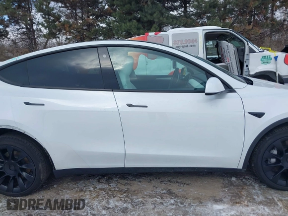 2023 Tesla Model Y Long Range with VIN 7SAYGAEE8PF706706, listed as a IAAI auction lot 41297340 with 24,428 mi miles and . Bid and sale history available at DreamBid. Image 14.