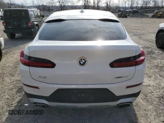 2024 BMW X4 xDrive30i z VIN 5UX33DT09R9U71062, wystawiony jako Copart lot #52200375 z przebiegiem 21 979 mil mil oraz Szkoda całkowita • Salvage title. Historia ofert i sprzedaży dostępna na DreamBid. Obrazek 6.