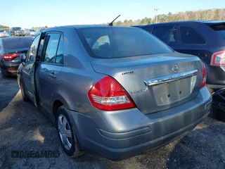 2011 Nissan Versa 1.8 S with VIN 3N1BC1AP9BL423170, listed as a IAAI auction lot 41821121 with 246,940 mi miles. Bid and sale history available at carsss.com. Image 3.