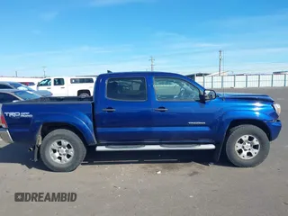 2015 Toyota Tacoma with VIN 3TMLU4ENXFM177755, listed as a IAAI auction lot 41867145 with 123,551 mi miles and . Bid and sale history available at DreamBid. Image 13.