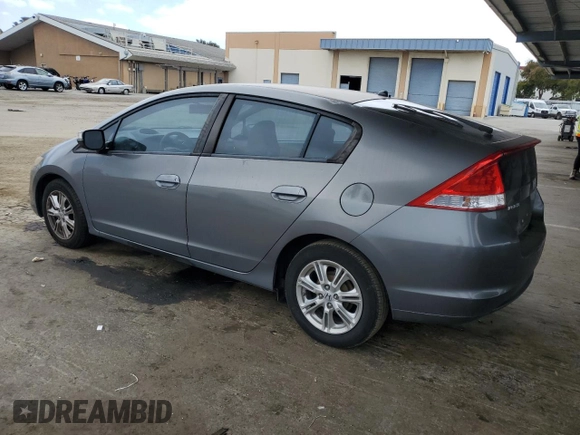 2011 Honda Insight EX with VIN JHMZE2H77BS006079, listed as a Copart auction lot 63873985 with 134,159 mi miles and Salvage title. Bid and sale history available at DreamBid. Image 2.