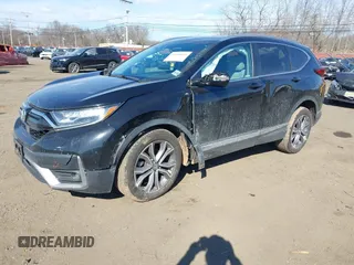 2020 Honda CR-V Touring with VIN 2HKRW2H98LH626651, listed as a IAAI auction lot 41668951 with 64,391 mi miles and . Bid and sale history available at DreamBid. Image 17.