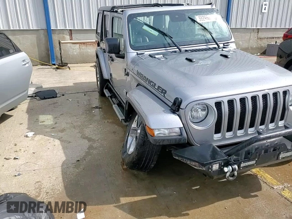2020 Jeep Wrangler Unlimited Sahara with VIN 1C4HJXEG7LW297722, listed as a Copart auction lot 55295025 with 69,064 mi miles and Salvage title. Bid and sale history available at DreamBid. Image 14.