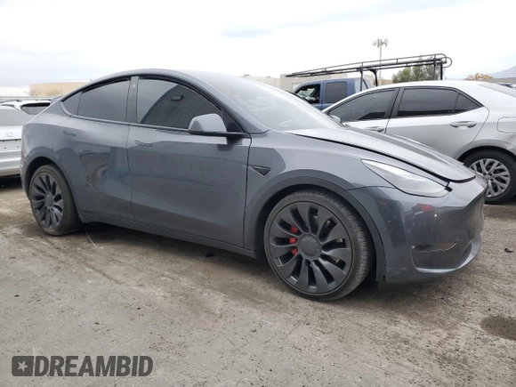 2022 Tesla Model Y Performance with VIN 7SAYGDEF1NF491967, listed as a Copart auction lot 51119515 with 50,520 mi miles and Salvage title. Bid and sale history available at DreamBid. Image 4.