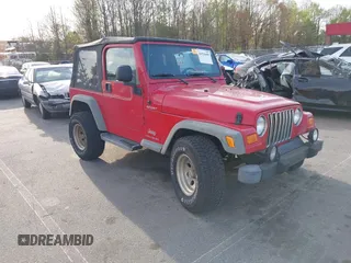 2003 Jeep Wrangler Sport with VIN 1J4FA49S13P320159, listed as a IAAI auction lot 41935699 with 212,355 mi miles. Bid and sale history available at carsss.com. Image 1.