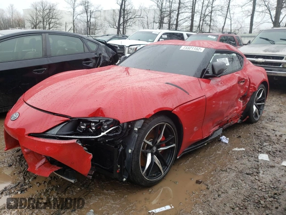 2021 Toyota Supra 3.0 z VIN WZ1DB0C02MW044450, wystawiony jako Copart lot #73321152 z przebiegiem Nie podano mil oraz . Historia ofert i sprzedaży dostępna na DreamBid. Obrazek 1.
