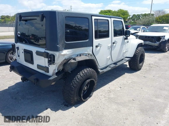 2010 Jeep Wrangler z VIN 1J4HB5H16AL186600, wystawiony jako IAAI lot #42147992 z przebiegiem 134 717 mil mil oraz . Historia ofert i sprzedaży dostępna na DreamBid. Obrazek 4.