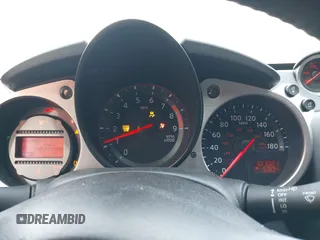 2014 Nissan 370Z Nismo with VIN JN1AZ4EH9EM636306, listed as a IAAI auction lot 41467766 with 101,021 mi miles and . Bid and sale history available at DreamBid. Image 7.