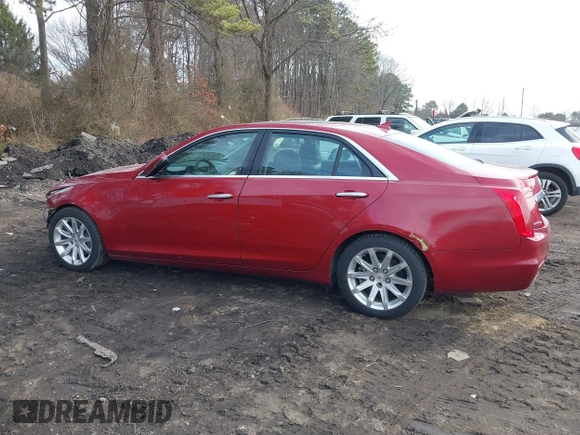 2014 Cadillac CTS Luxury AWD with VIN 1G6AX5S38E0146872, listed as a IAAI auction lot 41663642 with 56,787 mi miles and . Bid and sale history available at DreamBid. Image 14.