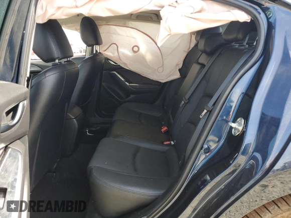 2017 Mazda 3 Grand Touring z VIN 3MZBN1M3XHM148604, wystawiony jako Copart lot #52258885 z przebiegiem Nie podano mil oraz Szkoda całkowita • Salvage title. Historia ofert i sprzedaży dostępna na DreamBid. Obrazek 10.