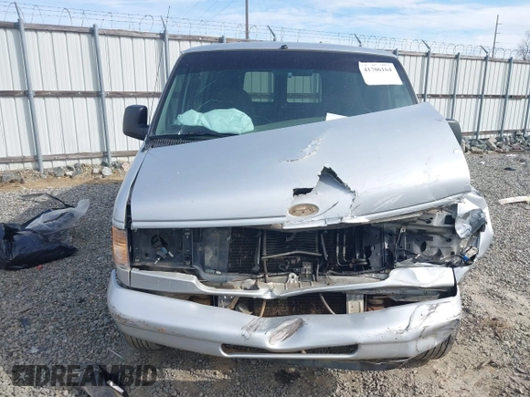 1998 Ford Econoline Cargo with VIN 1FTRE1428WHB30628, listed as a IAAI auction lot 41706164 with 153,223 mi miles. Bid and sale history available at carsss.com. Image 12.