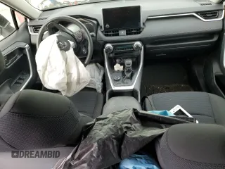 2023 Toyota RAV4 Hybrid LE with VIN JTMMWRFV3PD570648, listed as a Copart auction lot 86983174 with 27,258 mi miles and Salvage title. Bid and sale history available at DreamBid. Image 8.