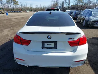 2019 BMW M4 with VIN WBS4Y9C5XKAG67446, listed as a IAAI auction lot 41669865 with 103,230 mi miles. Bid and sale history available at carsss.com. Image 16.