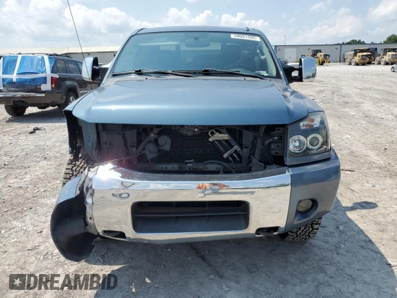 2011 Nissan Titan SL with VIN 1N6AA0EC4BN305296, listed as a Copart auction lot 59001395 with 194,557 mi miles and Salvage title. Bid and sale history available at DreamBid. Image 5.