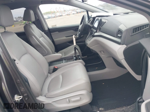 2018 Honda Odyssey EX-L z VIN 5FNRL6H72JB090127, wystawiony jako IAAI lot #42167788 z przebiegiem 114 984 mil mil oraz . Historia ofert i sprzedaży dostępna na DreamBid. Obrazek 5.