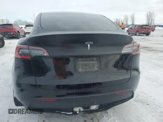 2021 Tesla Model Y Standard Range z VIN 5YJYGDED3MF120514, wystawiony jako Copart lot #46156775 z przebiegiem 93 470 mil mil oraz Szkoda całkowita • Salvage title. Historia ofert i sprzedaży dostępna na DreamBid. Obrazek 6.