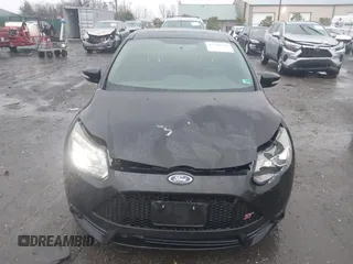 2014 Ford Focus ST with VIN 1FADP3L94EL180667, listed as a IAAI auction lot 41718746 with 141,574 mi miles and . Bid and sale history available at carsss.com. Image 6.