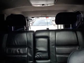 2003 Nissan Pathfinder LE z VIN JN8DR09Y73W801482, wystawiony jako Copart lot #56216005 z przebiegiem 238 781 mil mil oraz Szkoda całkowita • Salvage title. Historia ofert i sprzedaży dostępna na DreamBid. Obrazek 10.