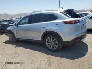2021 Mazda CX-9 Grand Touring z VIN JM3TCADY4M0512268, wystawiony jako Copart lot #62683464 z przebiegiem Nie podano mil oraz Szkoda całkowita • Salvage title. Historia ofert i sprzedaży dostępna na DreamBid. Obrazek 2.