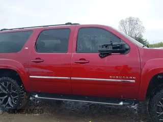 2010 Chevrolet Suburban LT with VIN 1GNUKJE38AR274572, listed as a IAAI auction lot 42022321 with 260,690 mi miles. Bid and sale history available at carsss.com. Image 14.