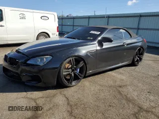 2013 BMW M6 z VIN WBSLZ9C56DDZ77892, wystawiony jako Copart lot #52102785 z przebiegiem 94 380 mil mil oraz Szkoda całkowita • Salvage title. Historia ofert i sprzedaży dostępna na DreamBid. Obrazek 1.
