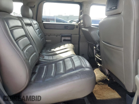 2003 Hummer H2 z VIN 5GRGN23U33H121992, wystawiony jako Copart lot #50388175 z przebiegiem 237 169 mil mil oraz Czysty tytuł • Clean title. Historia ofert i sprzedaży dostępna na DreamBid. Obrazek 11.