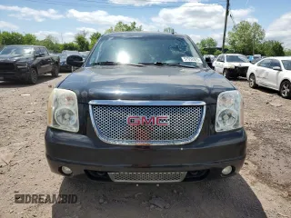 2011 GMC Yukon Denali z VIN 1GKS2EEF2BR308951, wystawiony jako Copart lot #57052825 z przebiegiem 217 895 mil mil oraz Tytuł czysty. Historia ofert i sprzedaży dostępna na DreamBid. Obrazek 5.