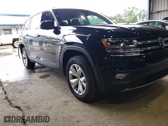 2018 Volkswagen Atlas SE z VIN 1V2DR2CA6JC544525, wystawiony jako Copart lot #55482545 z przebiegiem 131 950 mil mil oraz Szkoda całkowita • Salvage title. Historia ofert i sprzedaży dostępna na DreamBid. Obrazek 13.