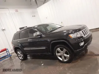 2011 Jeep Grand Cherokee Overland with VIN 1J4RR6GT7BC607735, listed as a IAAI auction lot 41830669 with 98,161 mi miles. Bid and sale history available at carsss.com. Image 14.